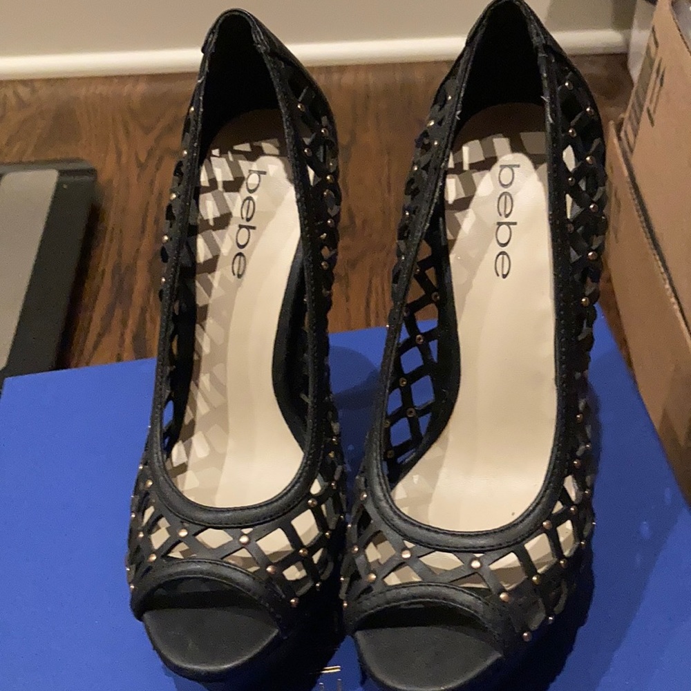 Bebe brand, size6, and black with gold dots.